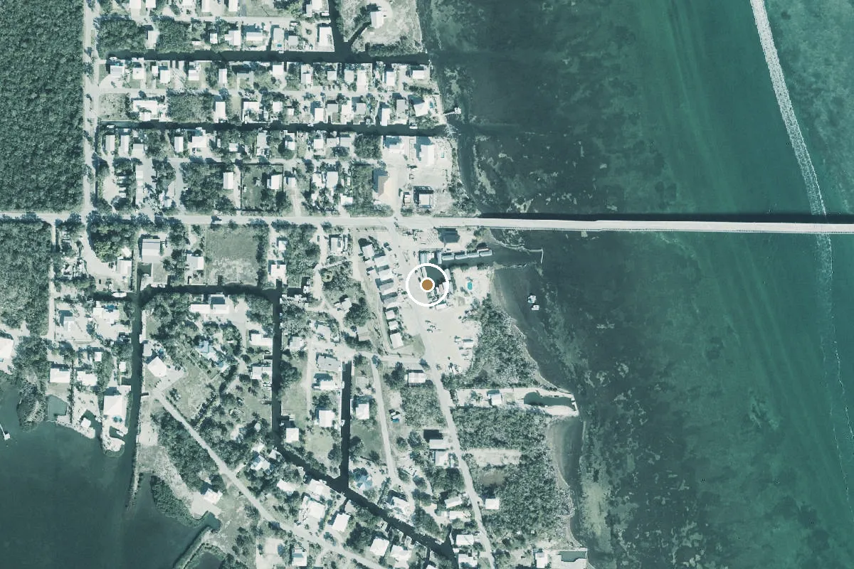 Aerial view of Old Wooden Bridge Guest Cottages And Marina